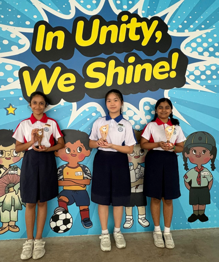 Unity Primary Students photo with the cert from Vivid Public Speaking Invitational